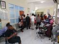 Babinkamtibmas Ujung Kawal Vaksinasi Covid-19 di Puskesmas Sawah Pulo