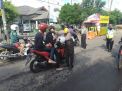 Personil Polsek Asemrowo Lakukan Check Poin di Pospam Jalan Dupak Rukun