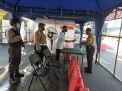 Polres Tanjung Perak Lakukan Pengecekan Suhu Badan Terhadap Tamu & Personil