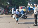Unit Lantas Polsek Asemrowo Lakukan Pengaturan Pagi Cegah Kemacetan