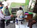 Panit Binmas Polsek Asemrowo Terapkan Sosial Distancing di Kantor Kelurahan