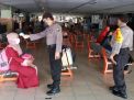 Polsek Pabean Cantikan Gelar Pengecekan Suhu Badan Penumpang Kereta Api
