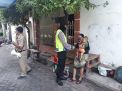 Babinkamtibmas Pegirian Bagikan Masker Gratis Ke Pemukiman