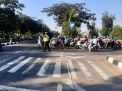 Unit Lantas Polsek Kenjeran Lakukan Pengaturan Pagi Cegah Kemacetan
