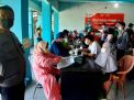 Polsek Semampir Kawal Vaksinasi di Lapangan Parkir Wisata Ampel