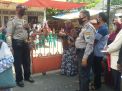 Babinkamtibmas Polsek Pabean Cantikan Kawal Pengambilan BLT di Kantor Pos