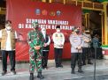 Kapolri dan Panglima TNI Melakukan Pengecekan Vaksinasi Massal COVID-19 Untuk Tekan Angka Penyebaran Virus Corona di Bangkalan