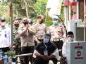Kunjungi TPS Dengan Bersepeda Motor, Kapolresta Banyuwangi Pastikan Pilkades Serentak Berjalan Aman