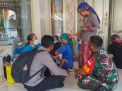 Polres Probolinggo Kota Gelar Vaksinasi Covid dan Tetanus Difteri Bagi Pelajar SD di Gili Ketapang