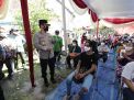 Polda Jatim Melaksanakan Vaksinasi komunitas masyarakat Papua di Surabaya
