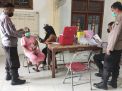 Polsek Krembangan Kawal Home Care Vaksin Yang Diadakan di Balai RW Tambak Asri