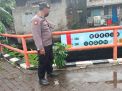 Polsek Krembangan Rutin Lakukan Pengecekan Pintu Air, Antisipasi Terjadinya Banjir