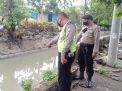 Polsek Semampir Rutin Lakukan Pengecekan Debit Air Sungai Semampir, Antisipasi Terjadinya Kenaikan Air