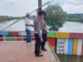 Polsek Kenjeran Lakukan Pengecekan Pintu Air, Pantau Apabila Terjadi Kenaikan Debit Air