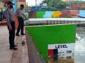 Polsek Asemrowo Lakukan Pengecekan Ketinggian Debit Air, Waspada Terjadinya Banjir
