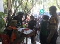 Polsek Kenjeran Amankan Kegiatan Vaksinasi Untuk Masyarakat di Puskesmas Kenjeran
