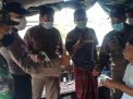 Polsek Asemrowo Bagikan Masker Ke Masyarakat Sekaligus Berikan Himbauan Patuhi Peraturan Prokes