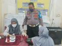 Bhabinkamtibmas Krembangan Lakukan Pengamanan Vaksinasi Booster Untuk Masyarakat, Pastikan Berjalan Lancar dan Aman