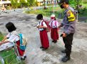Polsek Asemrowo Lakukan Pemantauan Kegiatan Belajar Tatap Muka, Pastikan Siswa Patuhi Protokol Kesehatan
