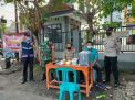 Pengamanan Vaksinasi Dilaksanakan Personil Bhabinkamtibmas Pegirian, Pastikan Kegiatan Berjalan Aman