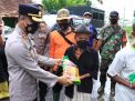 Hadir di Tengah Masyarakat Terdampak Banjir, Polres Jember Tanggap Bencana