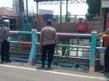 Polsek Kenjeran Pantau Ketinggian Debit Air, Antisipasi Adanya Potensi Banjir