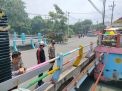 Pengeekan Ketinggian Air Rutin Dilaksanakan Polsek Kenjeran Antisipasi Adanya Potensi Banjir