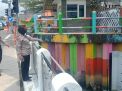 Polsek Kenjeran Laksanakan Patroli Ketinggian Pintu Air Jembatan Suroboyo, Pastikan Situasi Aman dan Tidak Ada Potensi Banjir