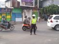 Personil Polsek Asemrowo Laksanakan Kegiatan Pemantauan Lalu Lintas, Pastikan Arus Lancar