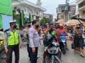 Polsek Krembangan Lakukan Kegiatan Pembagian Masker Sekaligus Ingatkan Peraturan Protokol Kesehatan