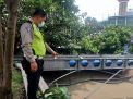 Polsek Semampir Cek Rutin Debit Air Sungai Pegirian, Waspada Adanya Potensi Banjir