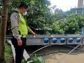 Polsek Semampir Rutin Cek Ketinggian Air Sungai Pegirian, Antisipasi Adanya Potensi Banjir