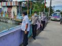 Polsek Kenjeran Lakukan Pengecekan Debit Air Sungai, Terpantau Dalam Situasi Normal