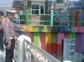 Polsek Kenjeran Pantau Ketinggian Pintu Air Jembatan Suroboyo, Situasi Aman Terkendali