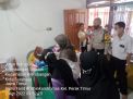 Polsek Pabean Cantikan Kawal Jalannya Vaksinasi di Jalan Indrapura, Pastikan Berjalan Aman dan Lancar