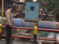 Polsek Krembangan Cek Debit Air di Pompa Air Jalan Babatan, Terpantau Situasi Dalam Kondisi Normal