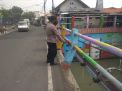 Polsek Kenjeran Pantau Ketinggian Air Sungai Kejawan, Waspada Adanya Potensi Banjir