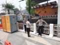 Polsek Krembangan Cek Ketinggian Debit Air Sungai, Antisipasi Adanya Potensi Banjir