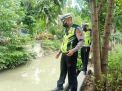 Polsek Semampir Cek Ketinggian Sungai Pegirian Secara Rutin, Waspada Adanya Potensi Banjir