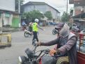 Polsek Asemrowo Laksanakan Pengaturan Lalu Lintas Sore, Bantu Kelancaran Kepulangan Pekerja