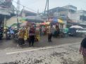 Polsek Kenjeran Cek Debit Air Sungai di Pintu Air Jembatan Suroboyo, Antisipasi Adanya Potensi Banjir