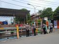 Polsek Kenjeran Lakukan Pengecekan Pintu Air Kejawan Lor, Pantau Adanya Kenaikan Debit Air