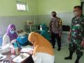 Bhabinkamtibmas Kelurahan Asemrowo Laksanakan Pemantauan Kegiatan Vaksin, Pastikan Berjalan Lancar