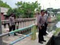 Polsek Kenjeran Lakukan Pengecekan Pompa Air Jeblokan Tambak Wedi, Situasi Terpantau Normal