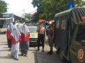 Polsek Semampir Laksanakan Giat Pemantauan Peziarah di Depan PMK, Situasi Terpantau Aman Terkendali