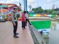Polsek Asemrowo Cek Ketinggian Debit Air Sungai Waspada Potensi Banjir