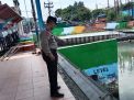 Polsek Asemrowo Cek Ketinggian Debit Pintu Air Balong, Waspada Potensi Banjir