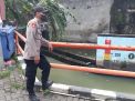 Polsek Krembangan Laksanakan Pemantauan Ketinggian Debit Pintu Air Jalan Tanjung Sadari, Terpantau Dalam Batas Normal