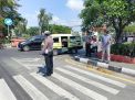 Polsek Kenjeran dan Pawas Bersatu Atasi Kemacetan di U Turn SMA 19
