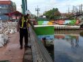 Polsek Asemrowo Cek Ketinggian Debit Air Sungai dan Pompa Air, Terpantau Masih Dalam Batas Normal